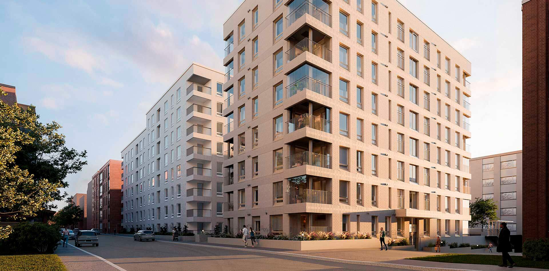 Visualisointi - Useat modernit kerrostalot, vaaleat julkisivut, parvekkeet, katu ja muutama ihminen kävelemässä. Puita kadun varrella.